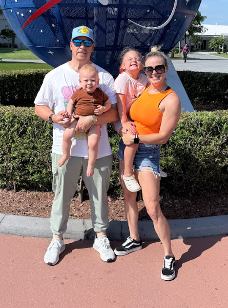 Coach Chris with Coach Ashley and her two kids