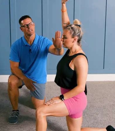 Coach Chris guiding a client through the Decompress phase